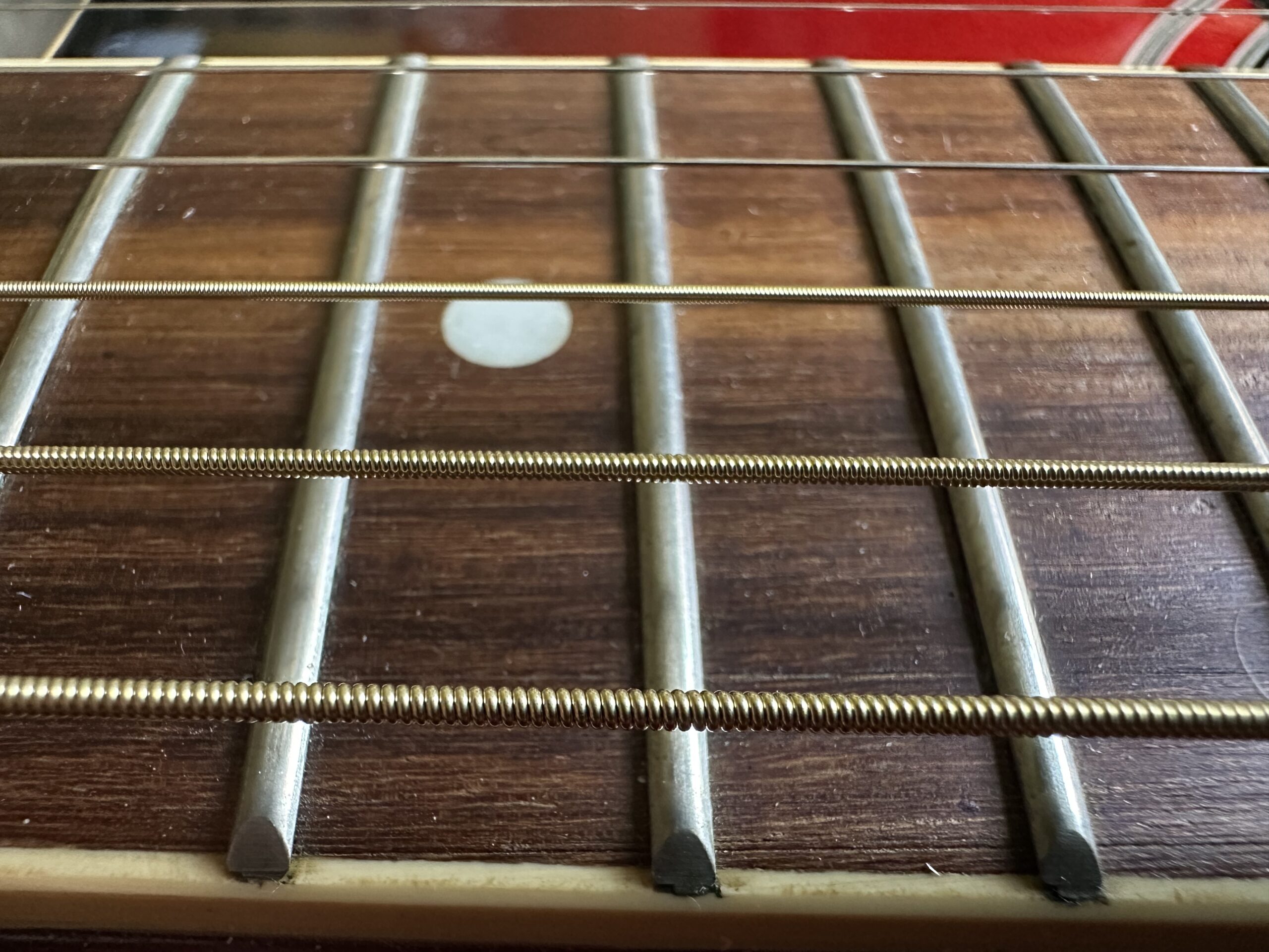 String over fingerboard