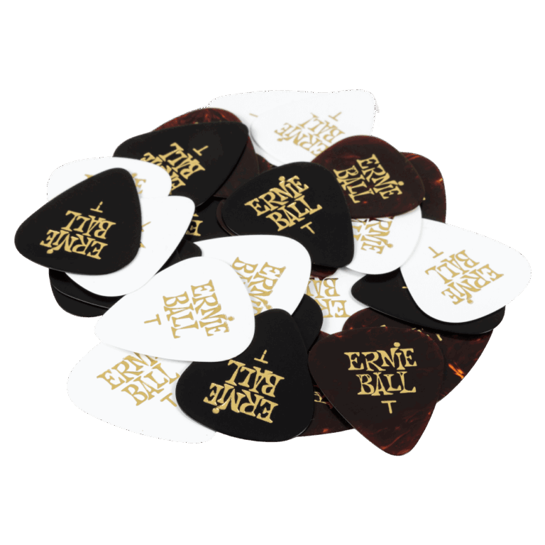 Ernie Ball guitar pick on a pile