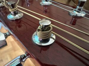 String around tunning peg